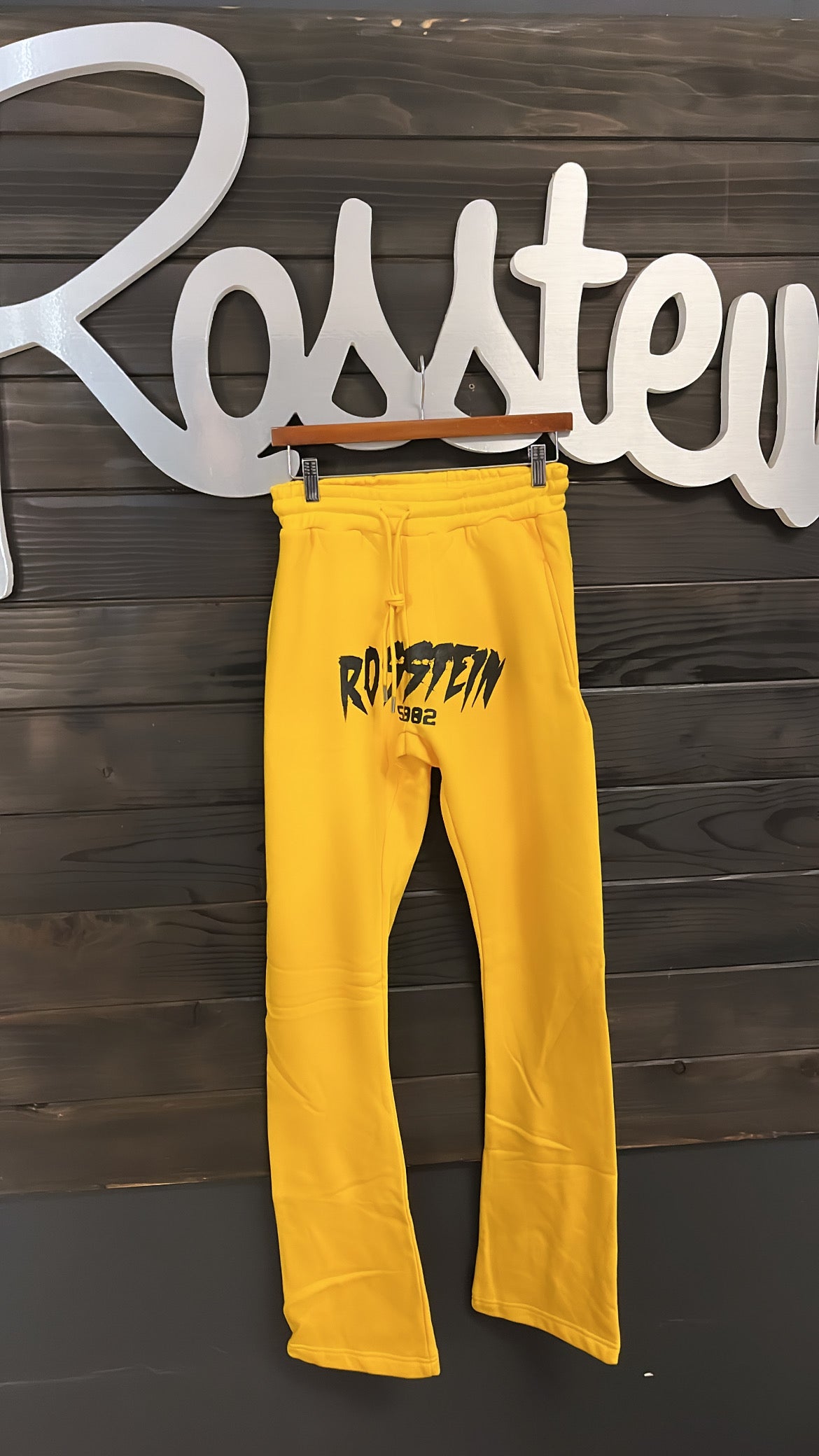 Stacked yellow joggers